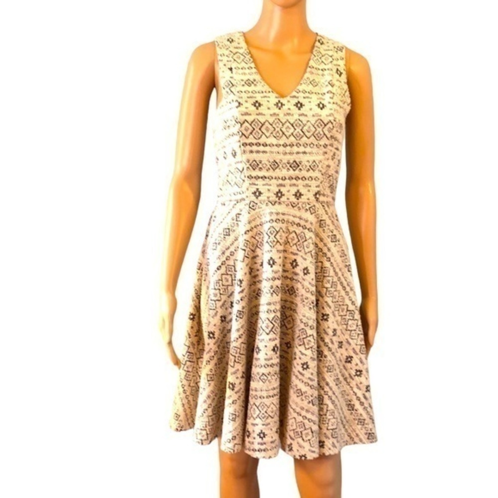Altered state dress size medium but it looks kind of on the small side. A-line​